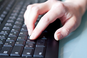 Image showing womans hand on a coumputer keyboard