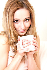 Image showing young beautiful girl with a cup of coffee