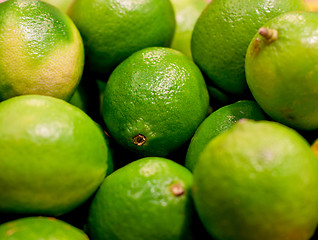 Image showing fresh green limes closeup 