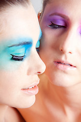 Image showing young beautiful woman with an extreme colorfull make up portrait