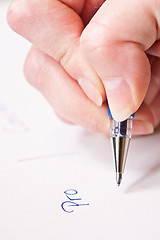 Image showing hand is writing pro and contra on paper 