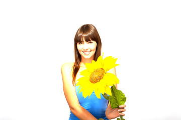 Image showing young beautiful brunette woman with a flower happy