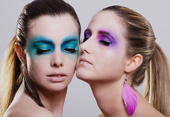 Image showing young beautiful woman with an extreme colorfull make up portrait