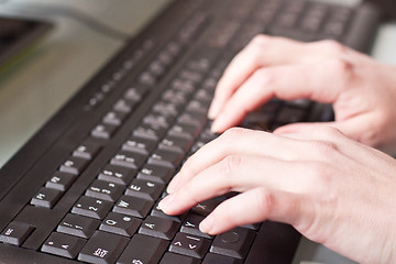 Image showing womans hand on a coumputer keyboard