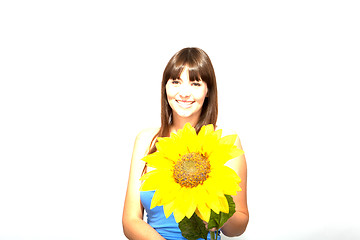 Image showing young beautiful brunette woman with a flower happy