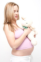 Image showing older pregnant woman looks forward to her baby