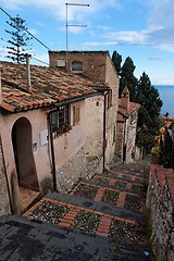 Image showing Small street in Sicilian town of Taormina descending toward the sea 