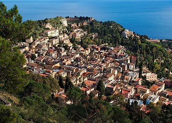 Image showing View of Taormina town with Roman theater and sea  from Monte Tauro  in Sicily,Italy