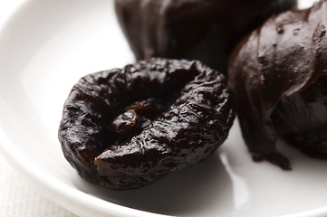 Image showing Dried plums in chocolate 