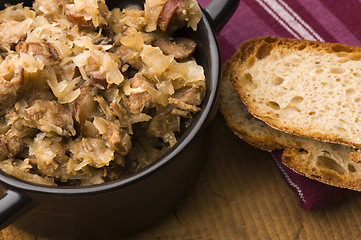 Image showing traditional polish sauerkraut (bigos) with mushrooms and plums