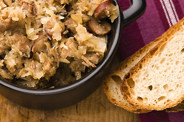 Image showing traditional polish sauerkraut (bigos) with mushrooms and plums