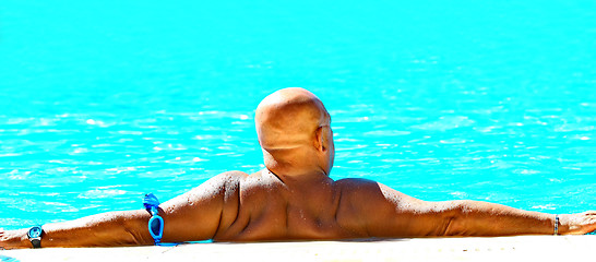 Image showing  Big man relax in swimming pool