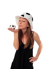 Image showing Woman kissing a little football