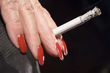 Image showing Red Fingernails and Cigarette (Side View)