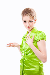 Image showing Beautiful smiling casual woman in green on isolated white