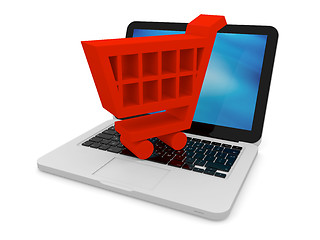 Image showing Red shopping trolley on laptop