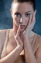 Image showing young beautiful woman with an extreme colorfull make up portrait