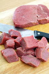 Image showing Cutting beef into cubes