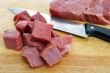 Image showing Cutting beef into cubes