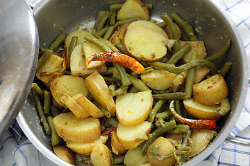 Image showing Cooking potato and bean curry