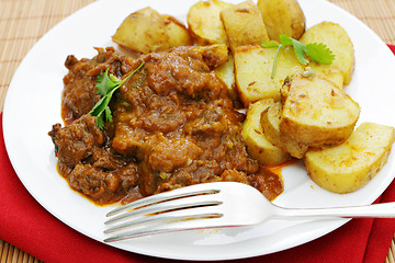 Image showing Beef and potato curries