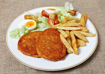 Image showing Breaded Chicken steak fries and salad