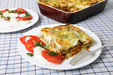 Image showing Lasagne verde and caprese salad