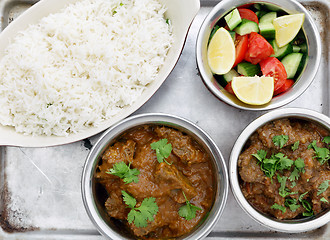 Image showing Beef curries with salad and rice
