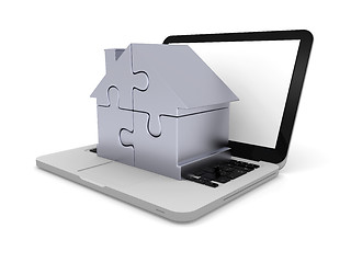 Image showing Home jigsaw on laptop