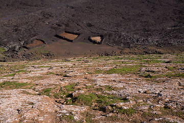 Image showing Farm underneath volcano