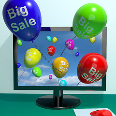 Image showing Sale Balloons Coming From Computer Showing Promotion Discount An