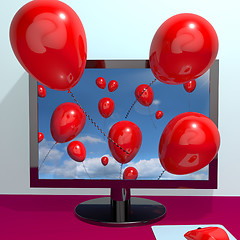 Image showing Red Balloons In The Sky And Coming Out Of Screen For Online Gree