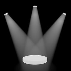 Image showing White Spotlights Shining On A Small Stage With Black Background
