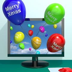 Image showing Colorful Balloons With Merry Xmas From Computer Screen For Onlin