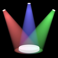 Image showing Red Blue And Green Spotlights Shining On A Small Stage With Blac