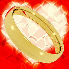 Image showing Gold Ring On Heart Bokeh Background Representing Love Valentine 