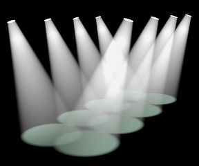 Image showing Eight White Spotlights In A Row On Stage For Highlighting Produc