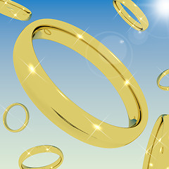 Image showing Gold Rings Falling From the Sky Representing Love Engagement Or 