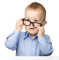 Image showing Portrait of a cute little boy wearing glasses