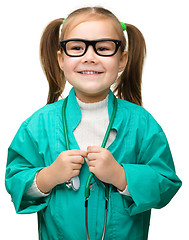 Image showing Cute little girl is playing doctor