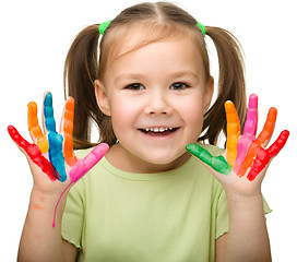 Image showing Portrait of a cute girl with painted hands