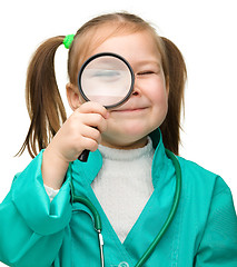 Image showing Little girl is playing doctor