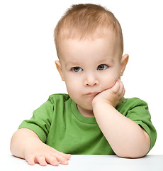 Image showing Portrait of a cute and pensive little boy