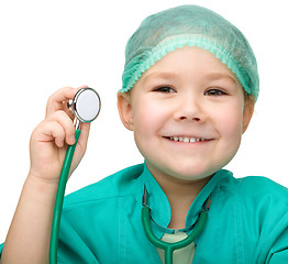 Image showing Little girl is playing doctor with stethoscope