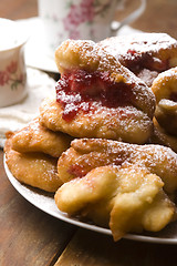 Image showing Sweet doughnuts with rose marmelade