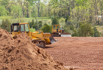 Image showing Large earth mover digger clearing land