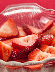 Image showing Fresh sliced strawberries in glass dish