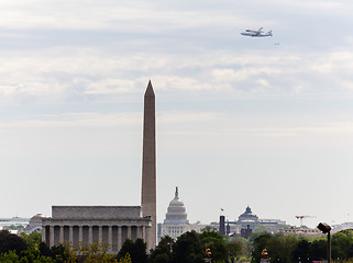 Image showing Space Shuttle Discovery flies over Washington