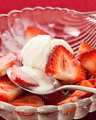 Image showing Fresh sliced strawberries in glass dish