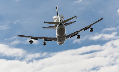 Image showing Space Shuttle Discovery flies over Washington